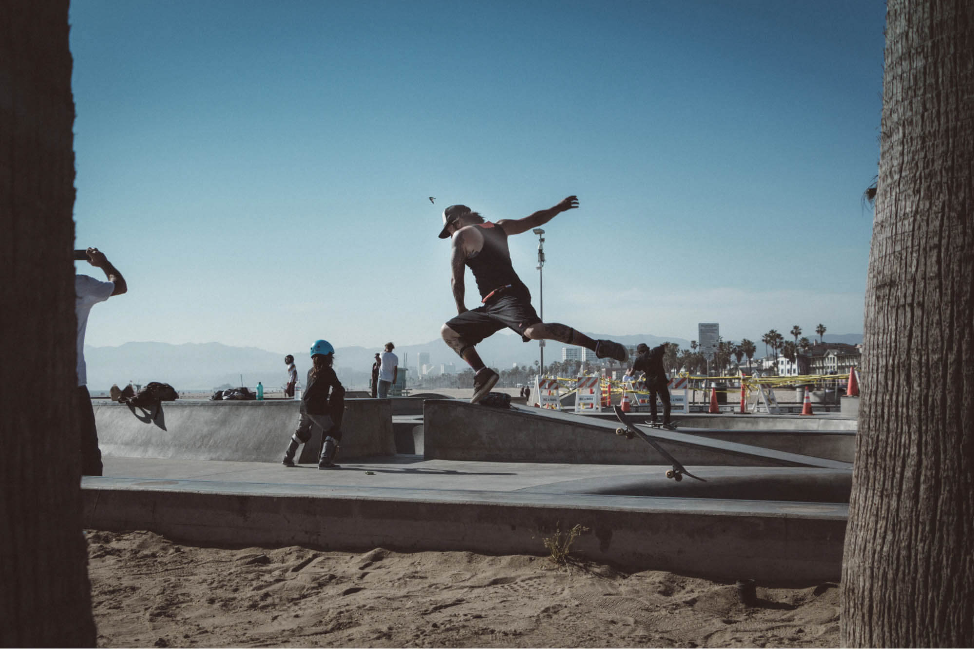 Student and instructor during a skateboarding lesson
