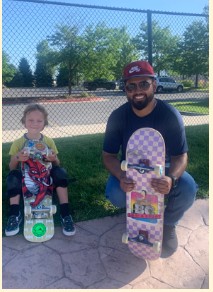 Student and instructor during a skateboarding lesson
